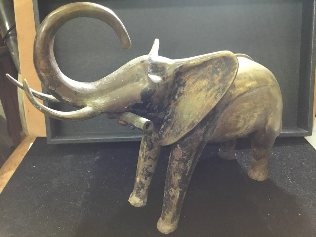 VINTAGE 9" Tall/Heavy Solid Brass Elephant Statue Figurine Trunk Up= Good Luck: This is a vintage solid brass elephant statue figurine that stands at 9 inches tall and is quite heavy weighing over 8lbs. The elephant's trunk is up, which is believed to bring good luck &