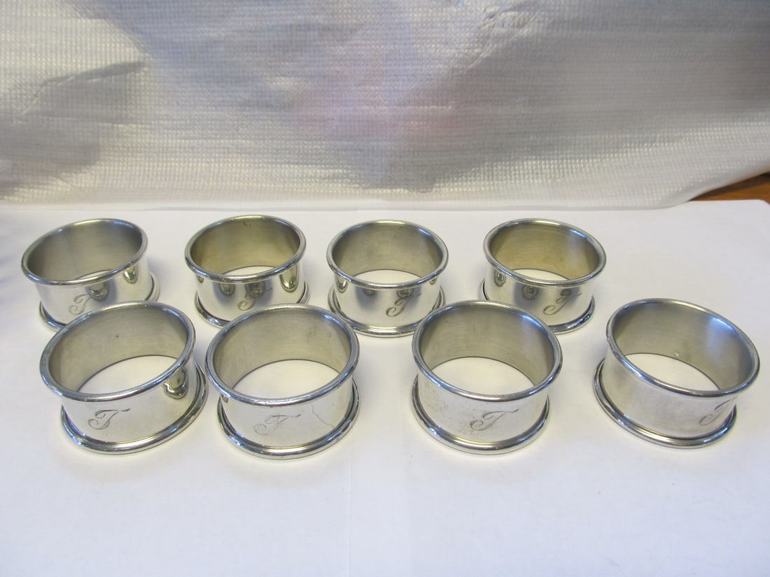 NAPKIN RINGS SET 8 MODERN STAINLESS STEEL 1 7/8 H XLNT COND FINE MONO": NAPKIN RINGS SET 8 MODERN STAINLESS STEEL 1 7/8" H XLNT COND FINE MONO Product Description: These nice modern napkin rings are in excellent condition with very little wear seen outside of some light