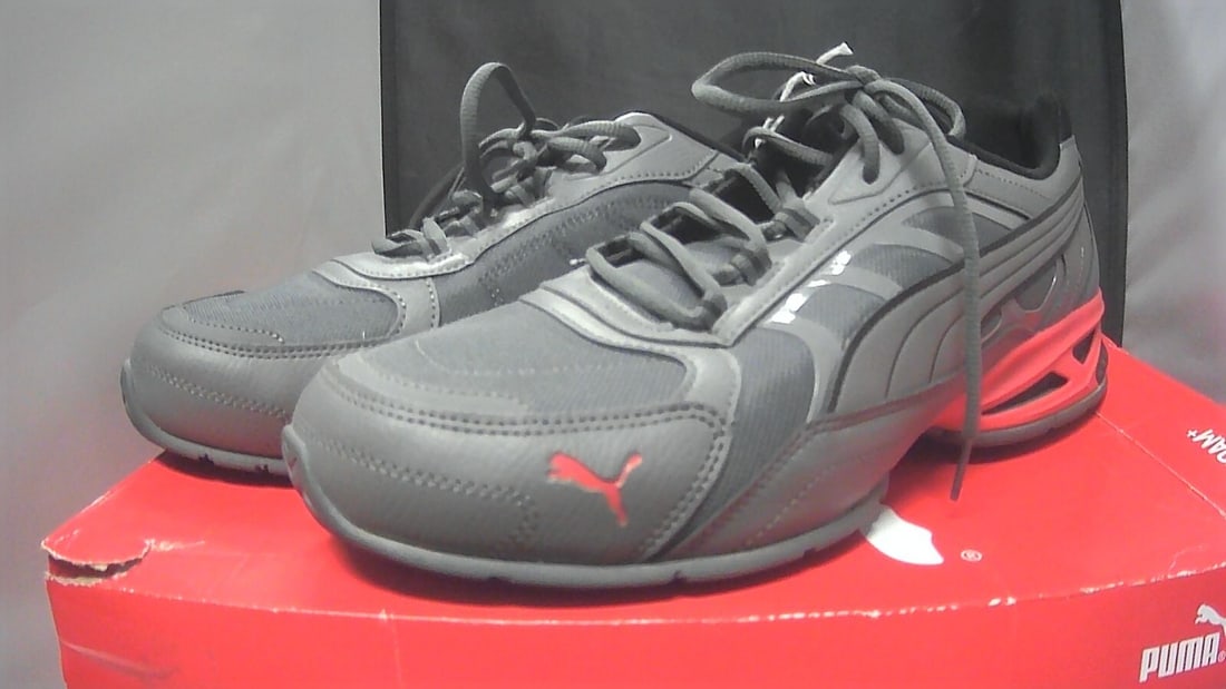 PUMA RESPIN WIDE GREY SIZE 12 MENS 382724 05: The product is a pair of Puma Respin Wide Grey sneakers in size 12 for men. These athletic shoes offer soft comfort and are designed with a wide shoe width for added space. The shoes feature a solid g