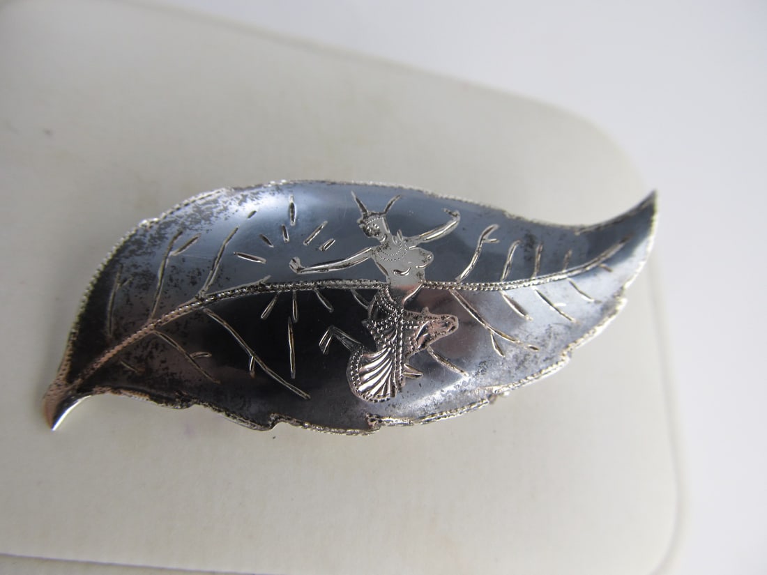 S SIAM NIELLO DANCER STERLING SILVER PIN 2" W V GOOD COND: This nicely-made, stamped S Siam Niello background sterling pin or brooch features an intricate dancer theme. It is in overall very good condition with very slight wear & is ready to enjoy. It has a n