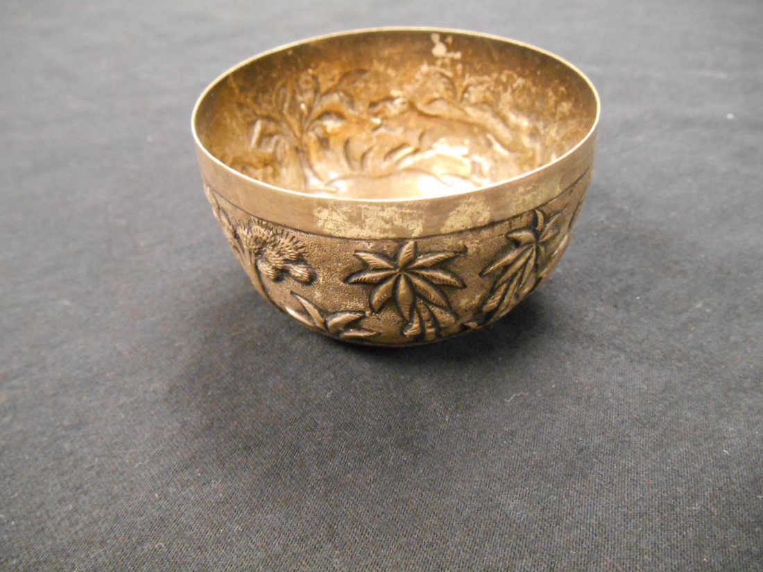 Vintage Silver Cup: Sterling silver cup with palm trees wrapped around it. Weighs 1.4 oz