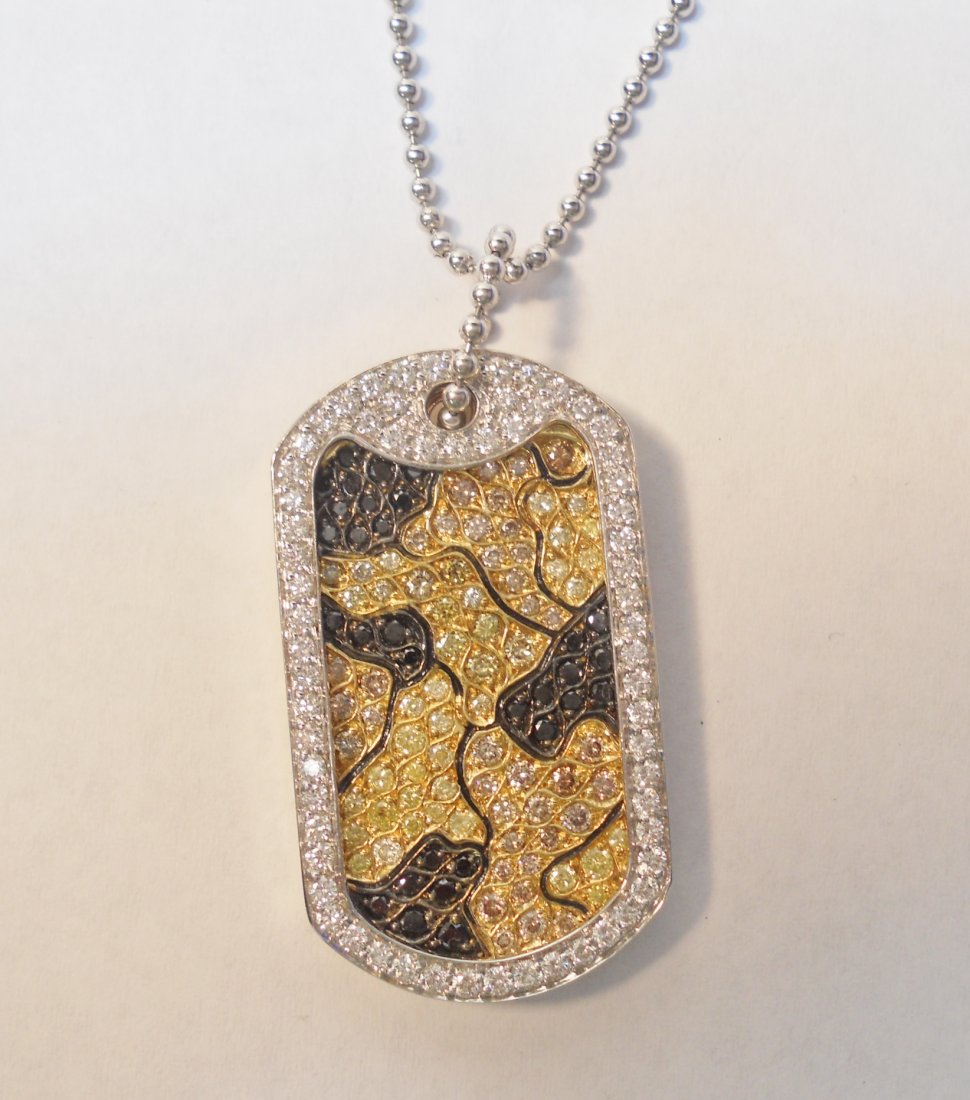 ROBERTO COIN “ARMY FOR PEACE” 18K GOLD PENDENT: Multi-colored natural diamonds. Yellow, clear, chocolate, Champaign, and black 1.7 to 2.2mm. Bead set in 18k White and yellow gold 18.1dwt. 18” 18k white gold bead chain. About 1” X 1.5” Pendent