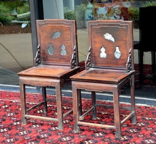 PAIR OF CHINESE ROSEWOOD CHAIRS WITH SOAPSTONE: PAIR OF ANTIQUE CHINESE ROSEWOOD CHAIRS WITH ORNAMENTAL SOAPSTONE ENCLOSED ON THE BACK.ONE CHAIR HAS LOST THE WOOD BACKING FOR THE STONE DUE TO AGE, AND EACH CHAIR MEASURES APPROX.36'' H, 17.5'' W, 15