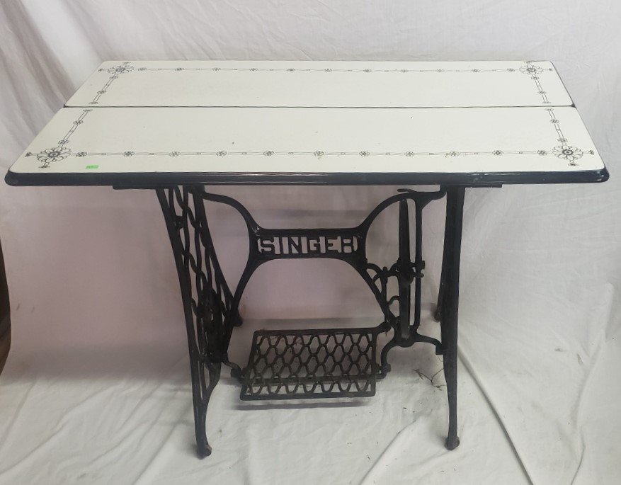 Singer Cast Iron Sewing Stand with Porcelain Top: Singer Cast Iron Sewing Stand with Porcelain Top 39"W x 20"D x 30"H
