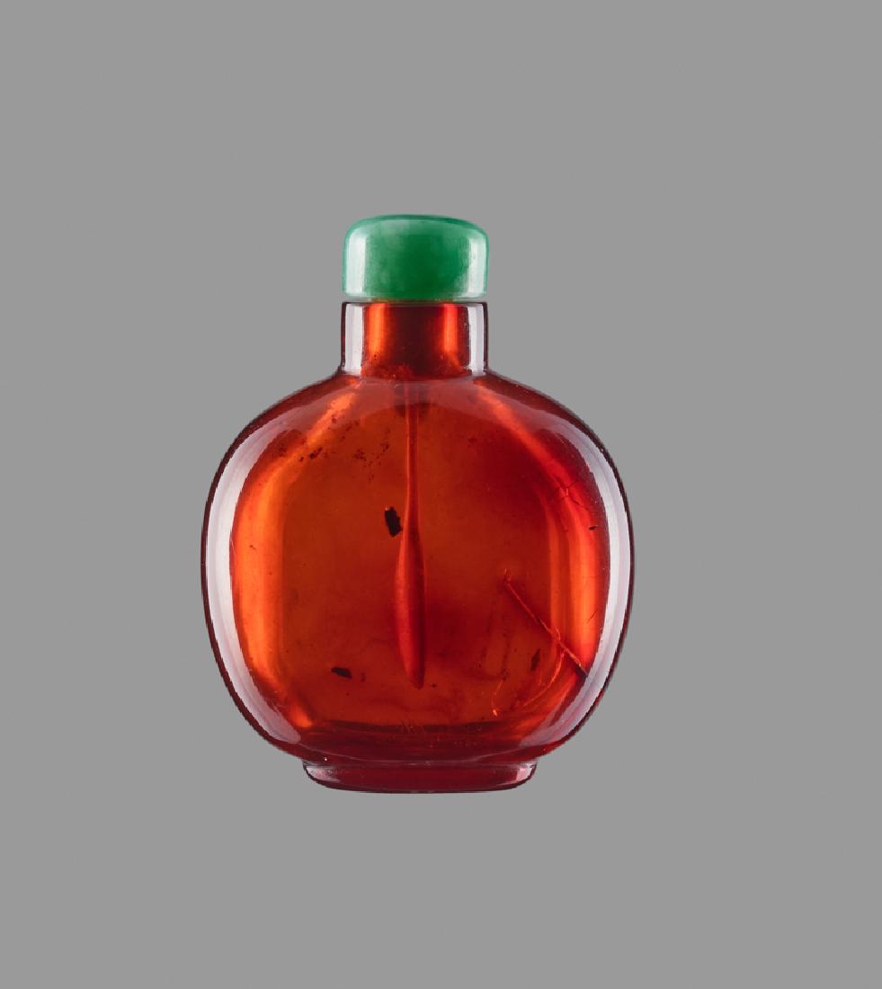A SMALL PLAIN AMBER SNUFF BOTTLE (1 of 6)