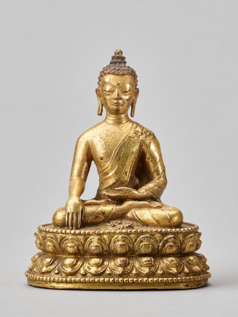 A GILT BRONZE FIGURE OF BUDDHA AKSHOBYA (1 of 6)