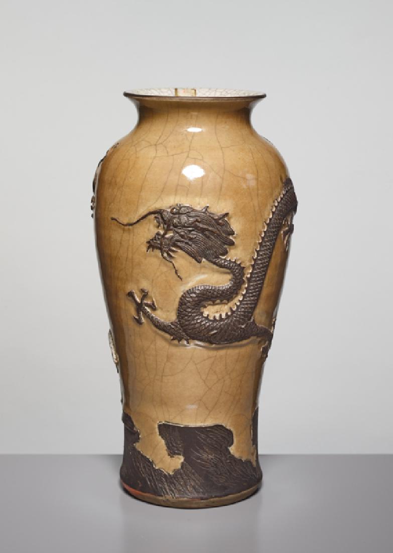 A CARVED 'DRAGON' PORCELAIN VASE, LATE QING DYNASTY