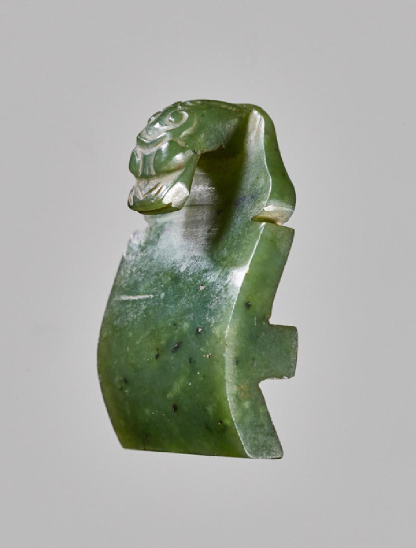 A SPINACH-GREEN JADE BELT HOOK (1 of 5)