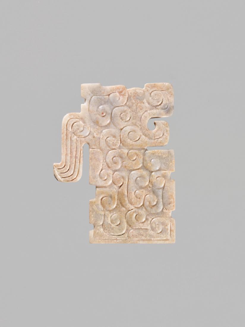 A WHITE AND GREY JADE RITUAL 'DRAGON' ORNAMENT (1 of 4)