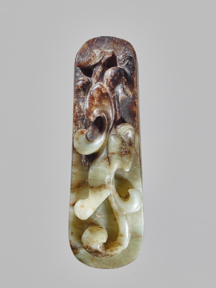 A CELADON AND BLACK JADE BELT HOOK, LATE MING DYNASTY (1 of 7)