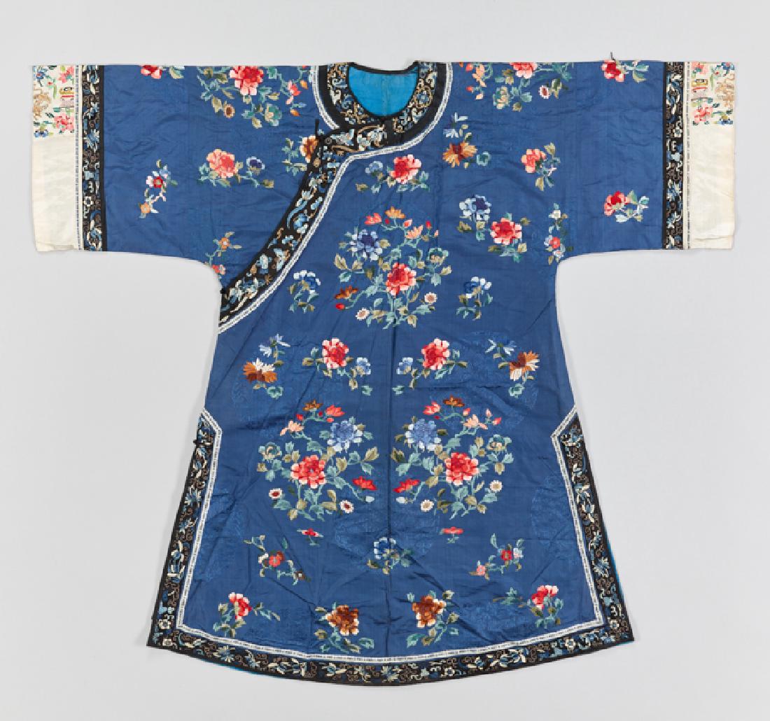 AN EMBROIDERED SILK MANCHU LADY'S ROBE, CHANGYI, QING (1 of 5)
