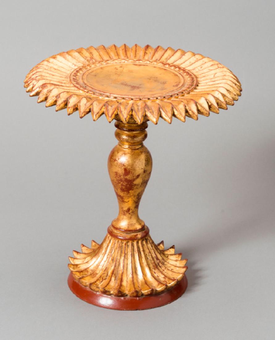 HIGH STEM FRUIT CUP: Wood, lacquer, gilding. Burma, ca. 1900 - 1930 An unusual and effective stem cup with powerfully crafted ridges and partly gilded. The base with encircling slightly curved ridges and topped by a stepp