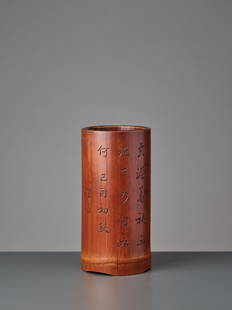 AN INSCRIBED BAMBOO BRUSHPOT WITH POEM BY SU SHI, 19c.: AN INSCRIBED BAMBOO BRUSHPOT WITH A POEM BY SU SHI, QING DYNASTY, 19TH CENTURY Bamboo with good old patina and well visible natural grain China, 19th century The cylindrical exterior of the bitong inc