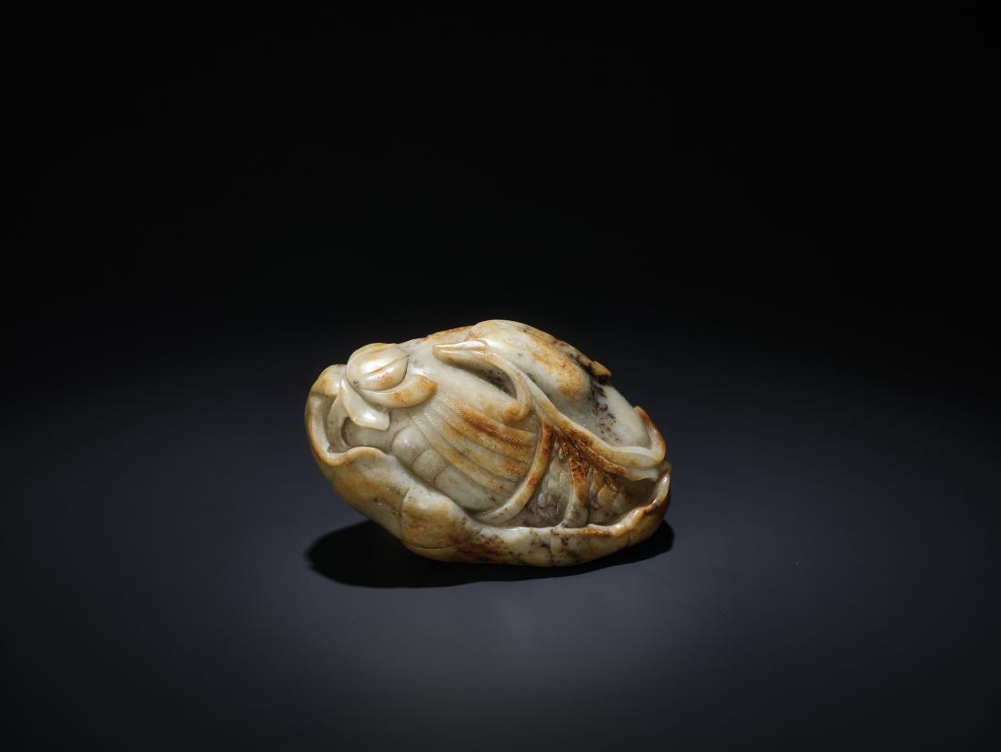 A 'MANDARIN DUCK AND LOTUS' JADE PEBBLE, MING (1 of 9)