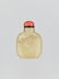 A YELLOW AND RUSSET JADE 'BUDDHIST LION' SNUFF BOTTLE - 3