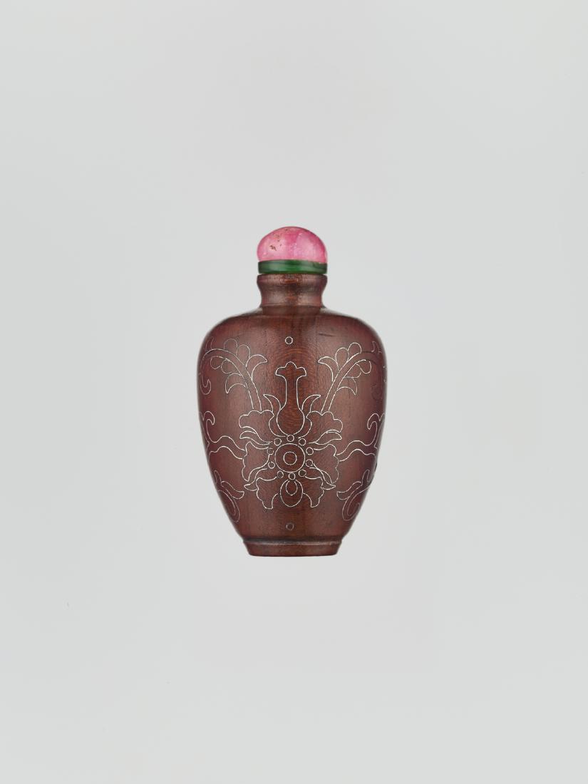 A SILVER INLAID HARDWOOD SNUFF BOTTLE, QING DYNASTY (1 of 4)