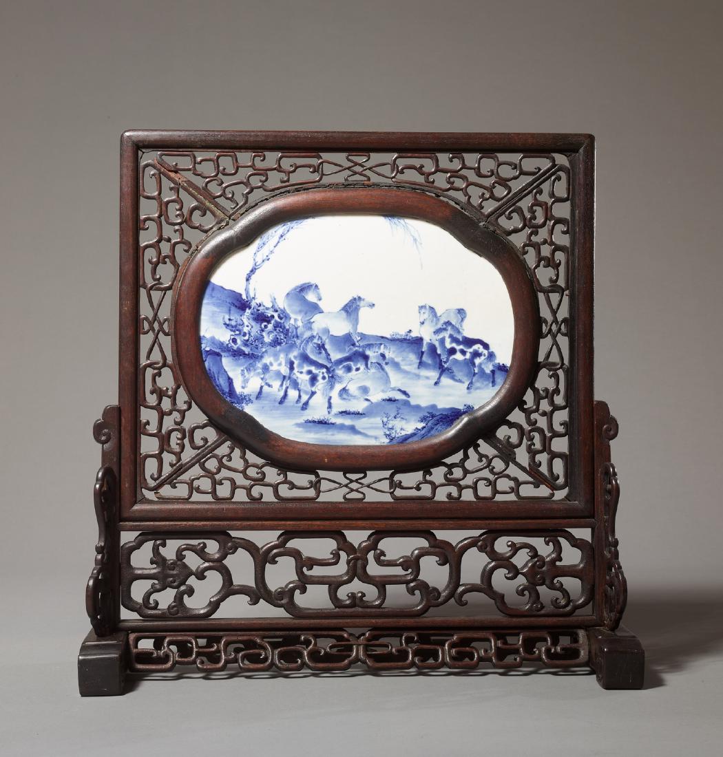 A BLUE WHITE 'EIGHT HORSES' TABLE SCREEN, KANGXI (1 of 7)