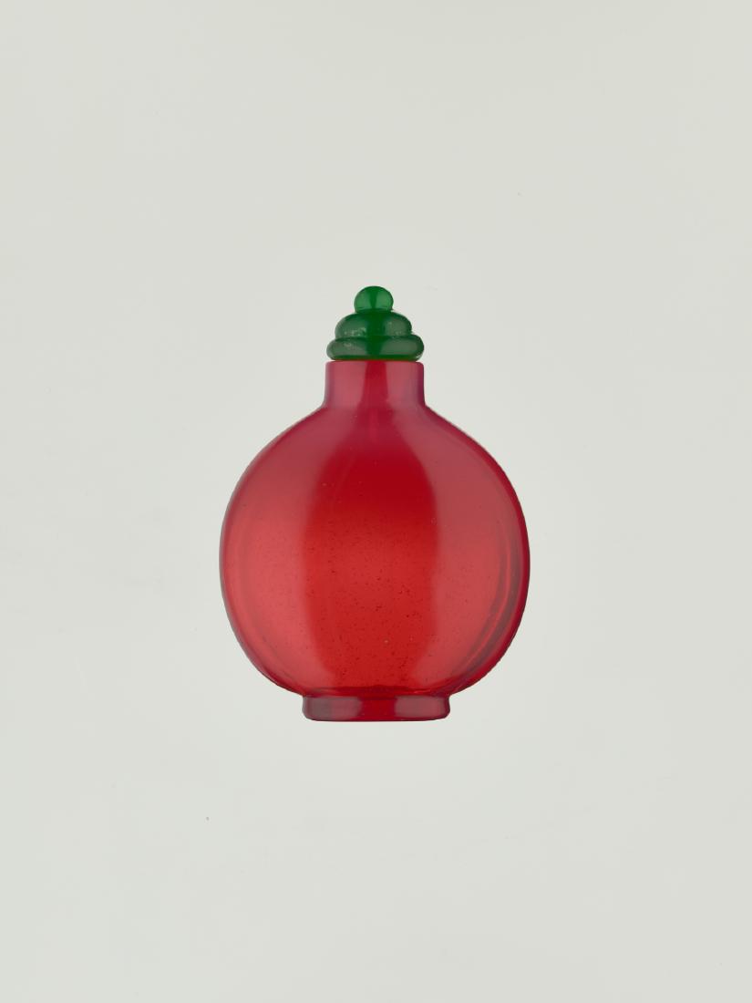 A PLAIN RUBY-PINK GLASS SNUFF BOTTLE, 1740-1800 (1 of 7)