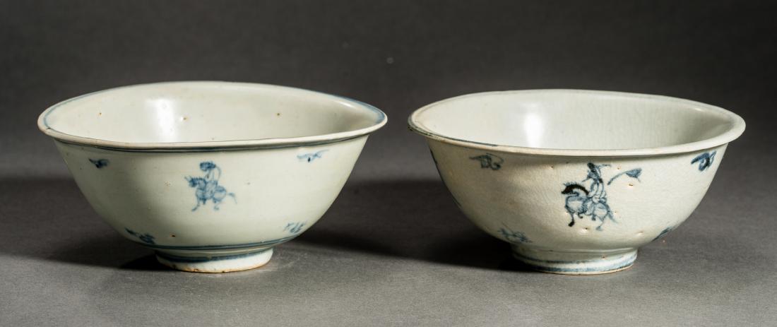 TWO GLAZED STONEWARE BOWLS: TWO GLAZED STONEWARE BOWLS Glazed stoneware China, Ming dynasty (1368-1644) Both pieces have curved sides as well as cobalt-blue painting attractively depicting four horseback riders on their steeds, 