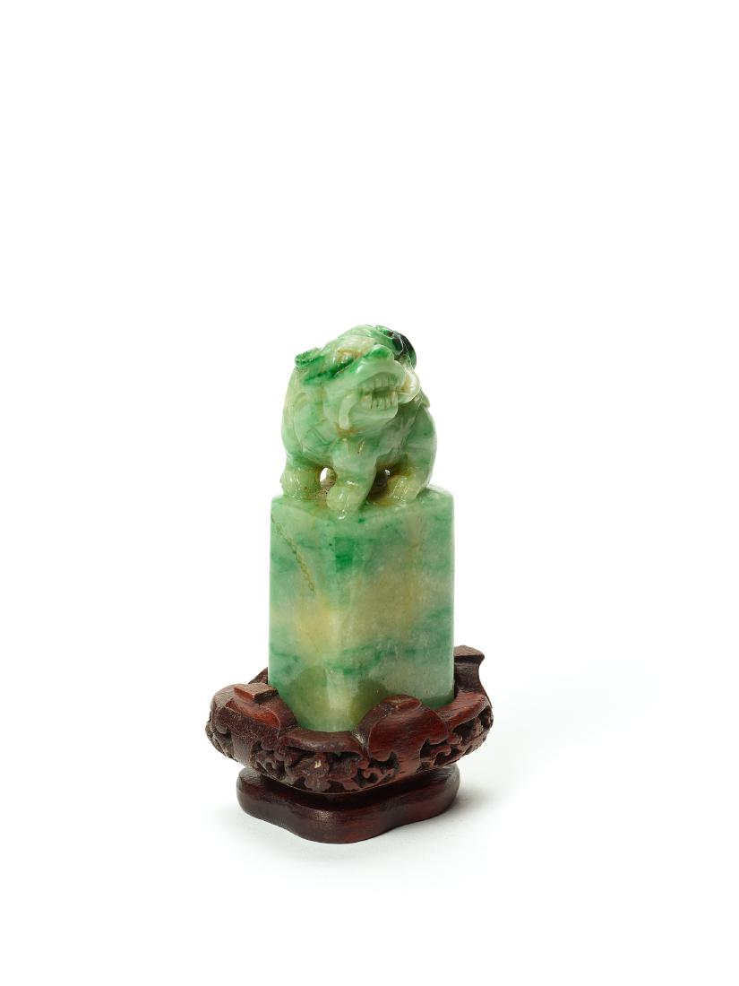A 'BUDDHIST LION AND LINGZHI' JADEITE SEAL: A ‘BUDDHIST LION AND LINGZHI’ JADEITE SEAL Jadeite China, 20th century The uncut seal of rectangular form with Buddhist lion holding a lingzhi mushroom in his mouth. Dimensions: HEIGHT 7.5