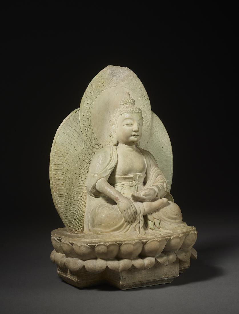 A QING DYNASTY MARBLE BUDDHA: A QING DYNASTY MARBLE BUDDHA China, late 18th - 19th century. Subtle and refined carving of Buddha Shakyamuni seated in Dhyanasana atop a double lotus pedestal, one hand in Bhumisparsa mudra. Provenan