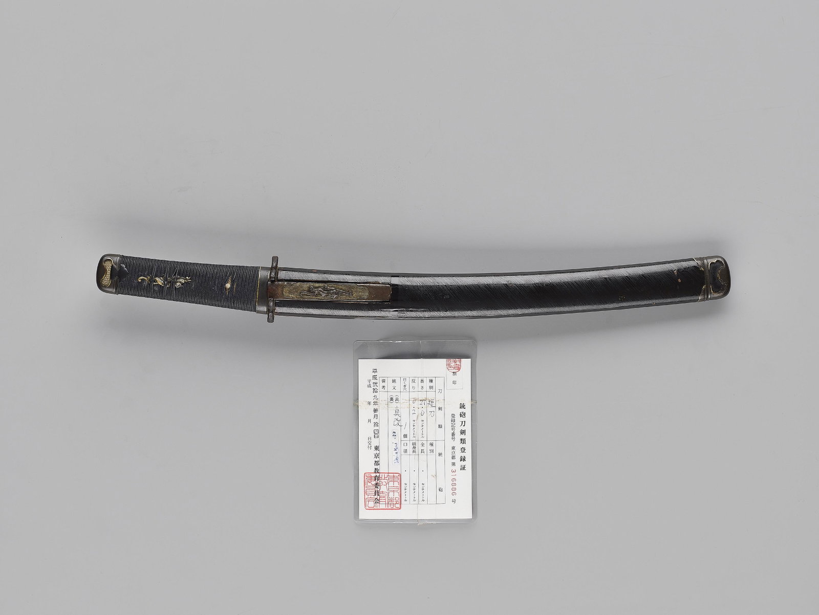 SHINKAI: A TANTO IN KOSHIRAE: SHINKAI: A TANTO IN KOSHIRAE By Shinkai, signed Shinkai Japan, c. 17th century, Edo period (1615-1868) The blade: Hira-zukuri with iori mune, the hamon shows irregular wave. Notare-midare. The tang is