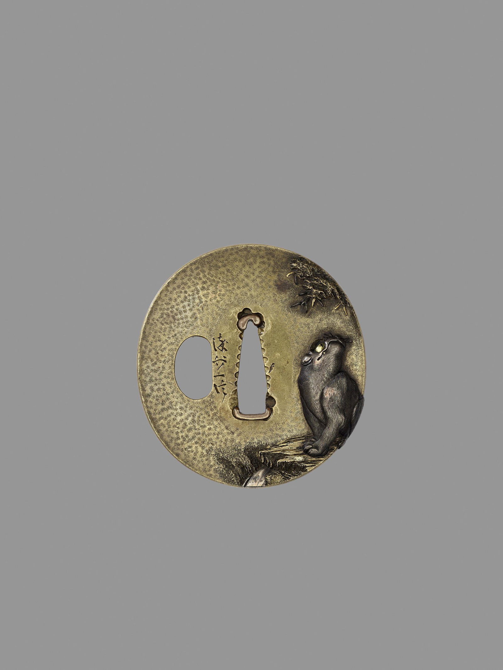 SOMEYA KAZUNOBU: A FINE SENTOKU TSUBA WITH TIGER: SOMEYA KAZUNOBU: A FINE SENTOKU TSUBA WITH TIGER By Someya Kazunobu (active ca. 1848-1850), signed Someya Kaznobu Japan, 19th century, Edo period (1615-1868) A sentoku tsuba of marugata shape, decorat