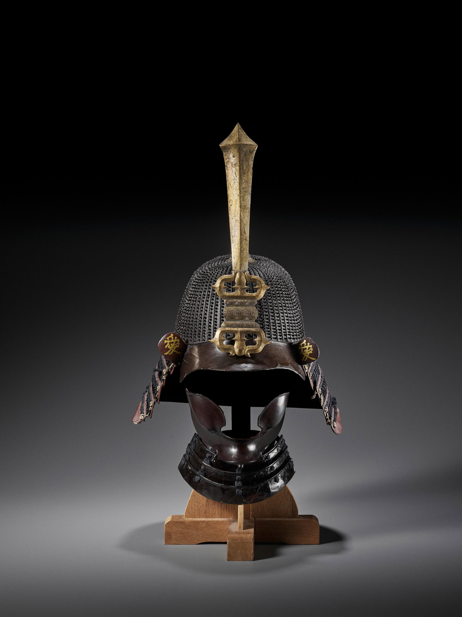 AN IMPORTANT KO-BOSHI KABUTO WITH KEN MAEDATE: AN IMPORTANT KO-BOSHI KABUTO (HELMET WITH STANDING RIVETS) WITH IMPRESSIVE KEN MAEDATE (FRONT CREST) Attributed to Norikuni (active 1532-1554) Japan, Kozuke (Joshu), 1532-1554, Muromachi period (1336-
