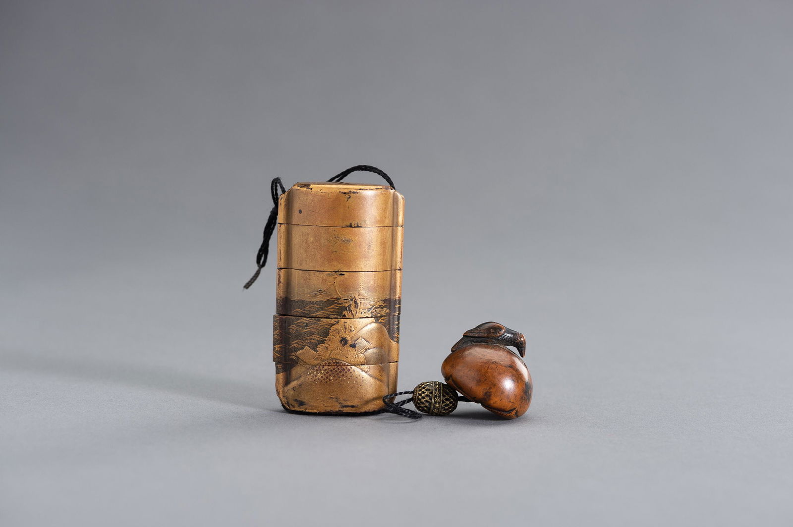 A SMALL GOLD LACQUERED FOUR-CASE INRO (1 of 10)