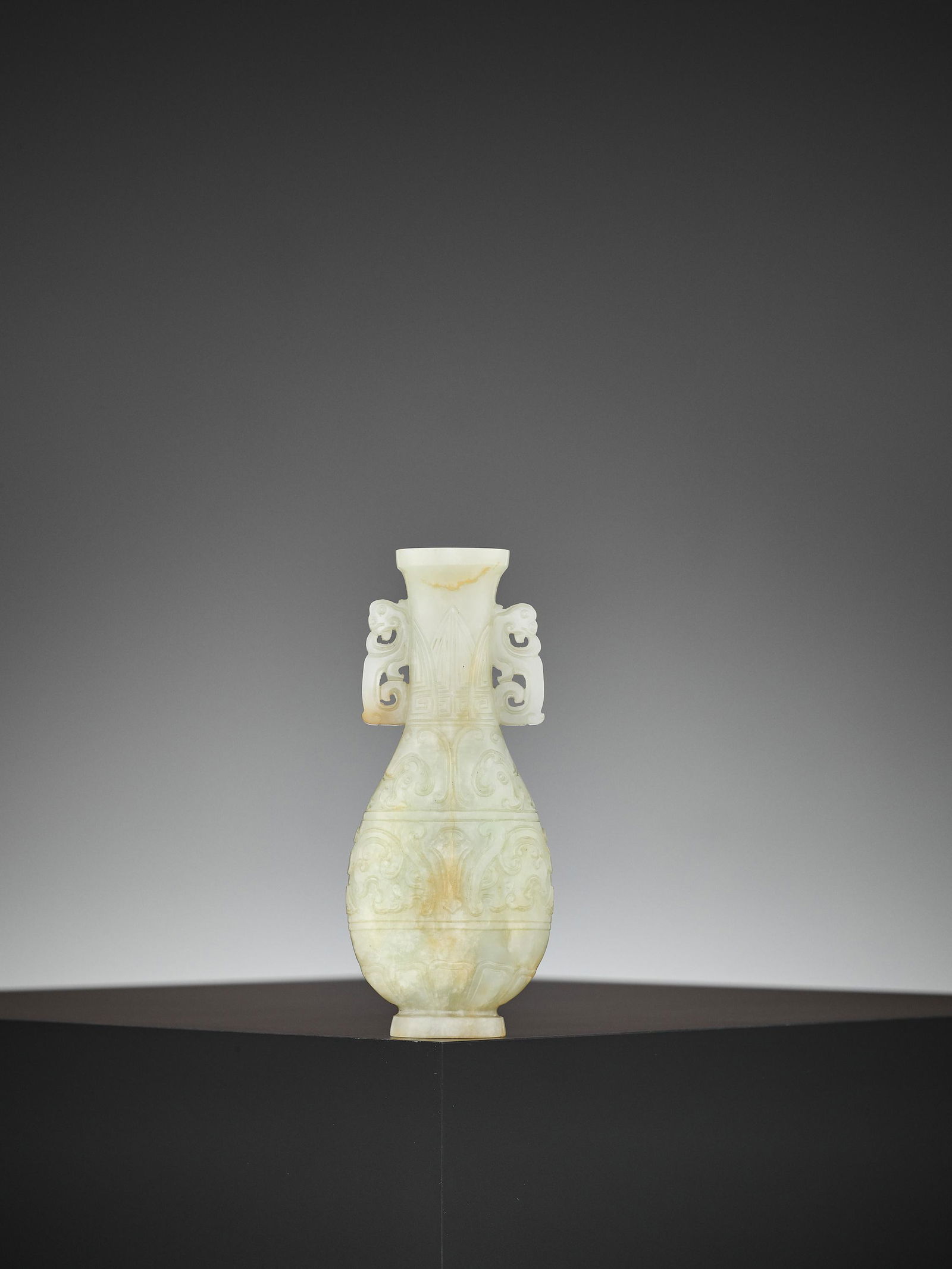 A CELADON AND RUSSET JADE HU, QIANLONG PERIOD (1 of 12)