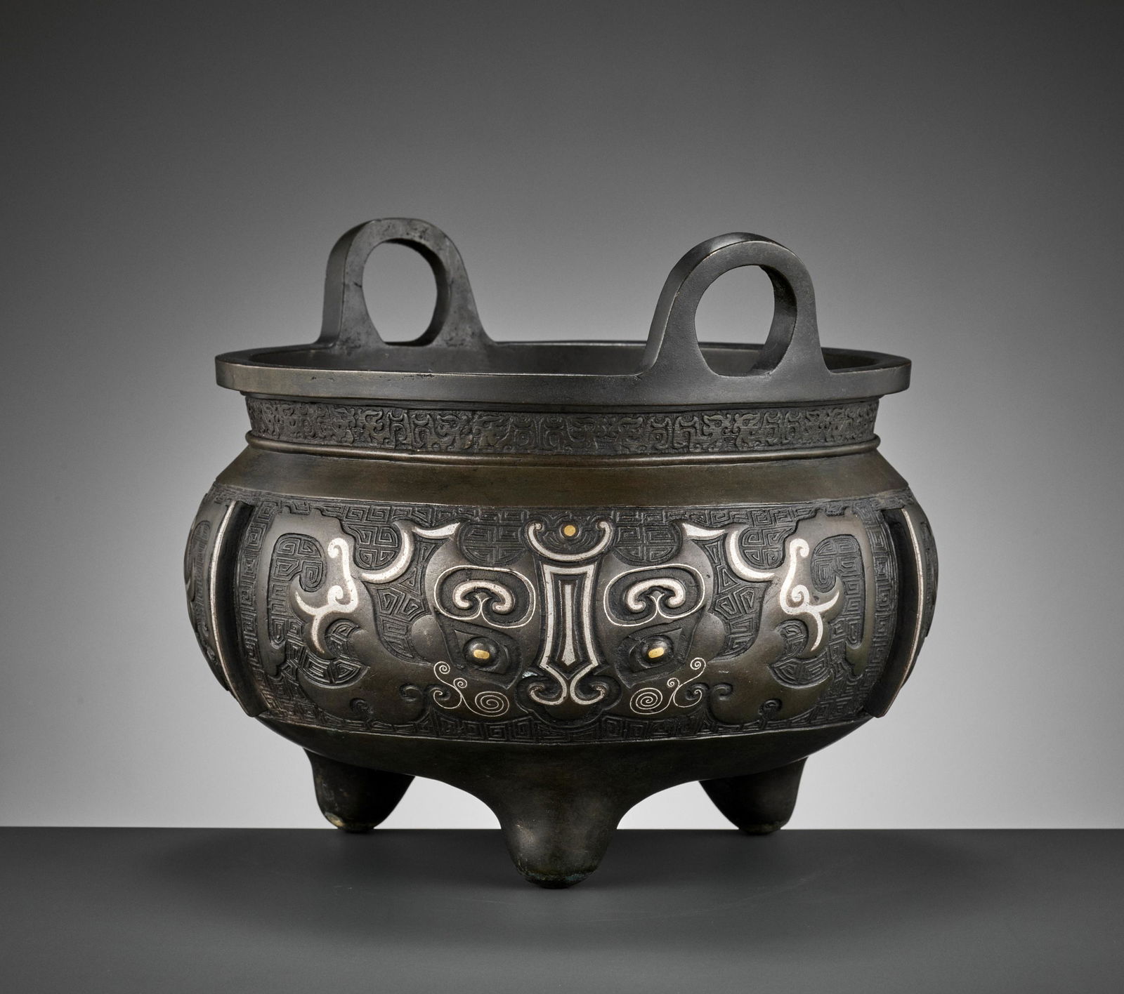 A SILVER-INLAID BRONZE TRIPOD CENSER, MING-QING (1 of 10)