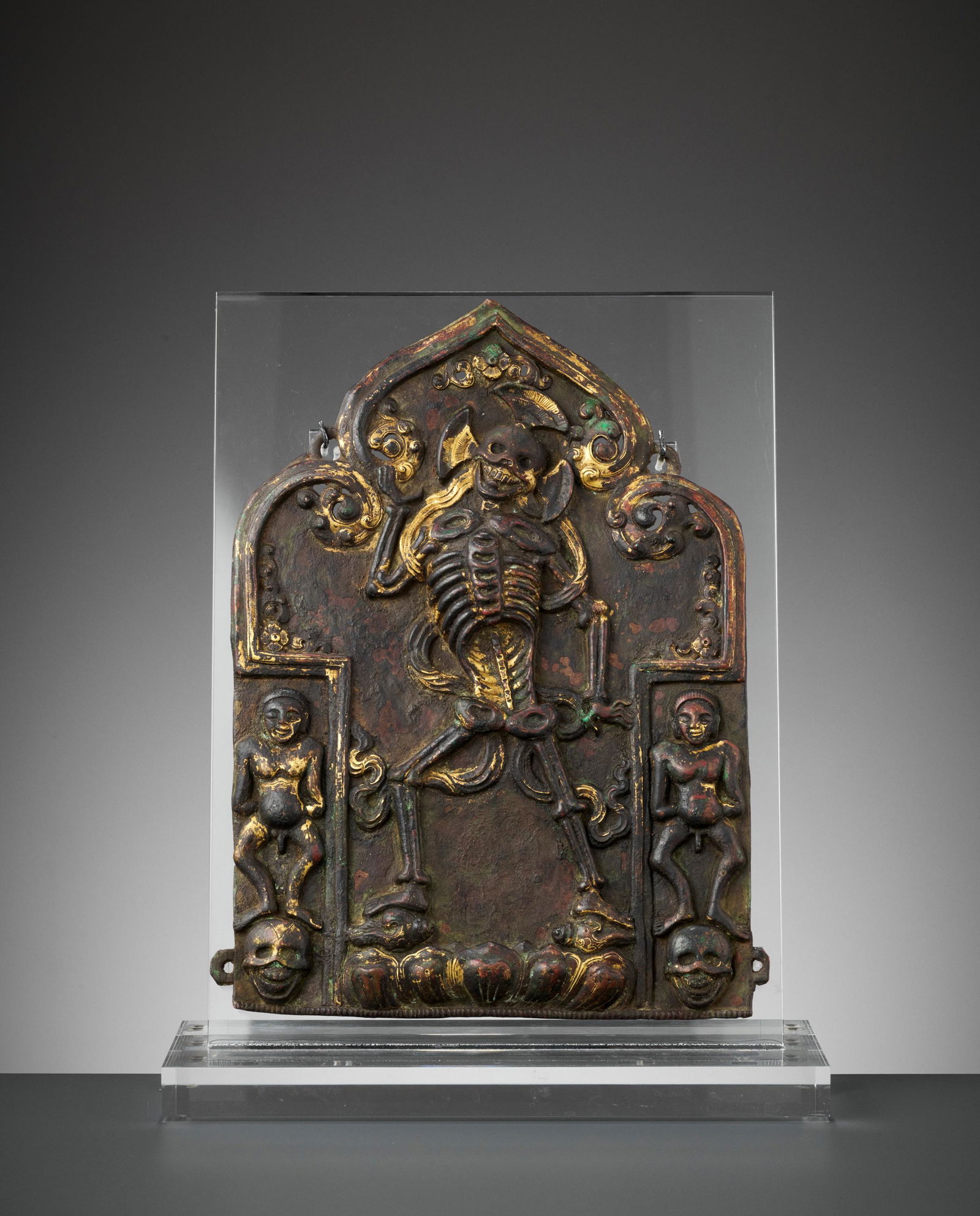 A GILT COPPER-ALLOY REPOUSSE PLAQUE OF CITIPATI (1 of 11)