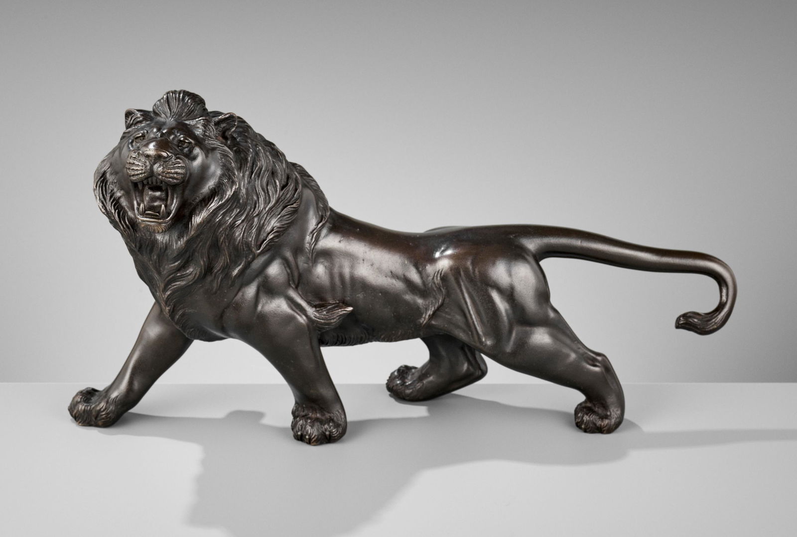 SEIYA: A LARGE BRONZE OKIMONO OF A ROARING LION (1 of 14)