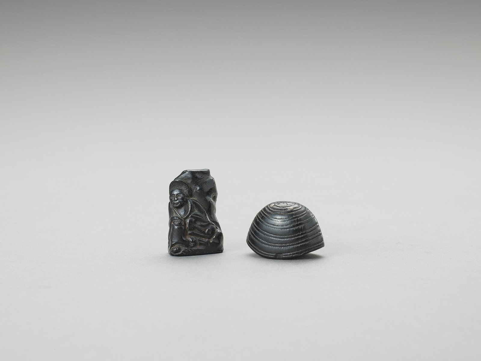 TWO EBONY WOOD NETSUKE (1 of 5)