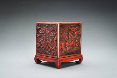 A CINNABAR LACQUER 'IMMORTALS AND BUDAI' BOX AND COVER, QING