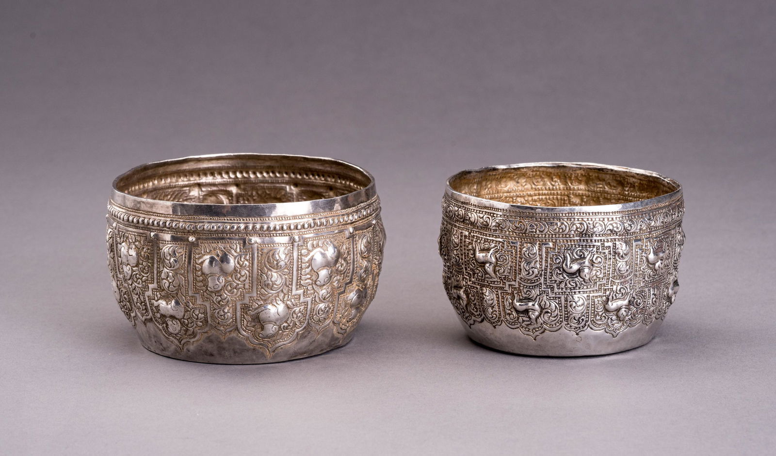 A LOT WITH TWO EMBOSSED SILVER BOWLS (1 of 8)
