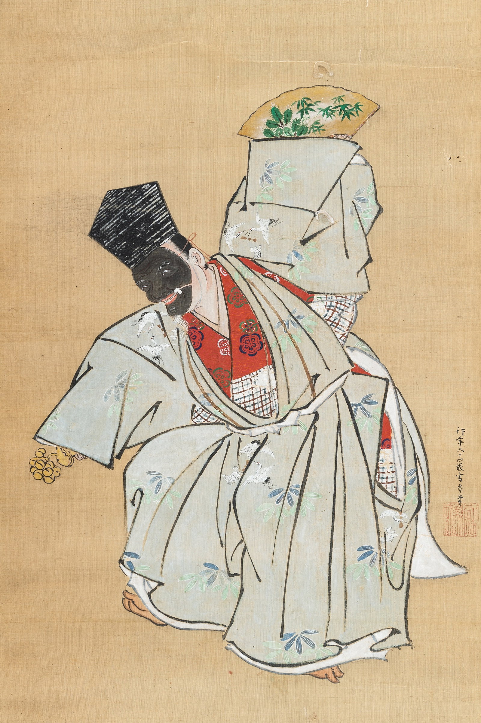 A SCROLL PAINTING OF AN OKINA DANCER, MEIJI: A SCROLL PAINTING OF AN OKINA DANCER, MEIJI Japan, Meiji period (1868-1912). Ink, gouache and watercolor on silk, with a fabric coated paper frame and mounted as a hanging scroll with bone handles. De