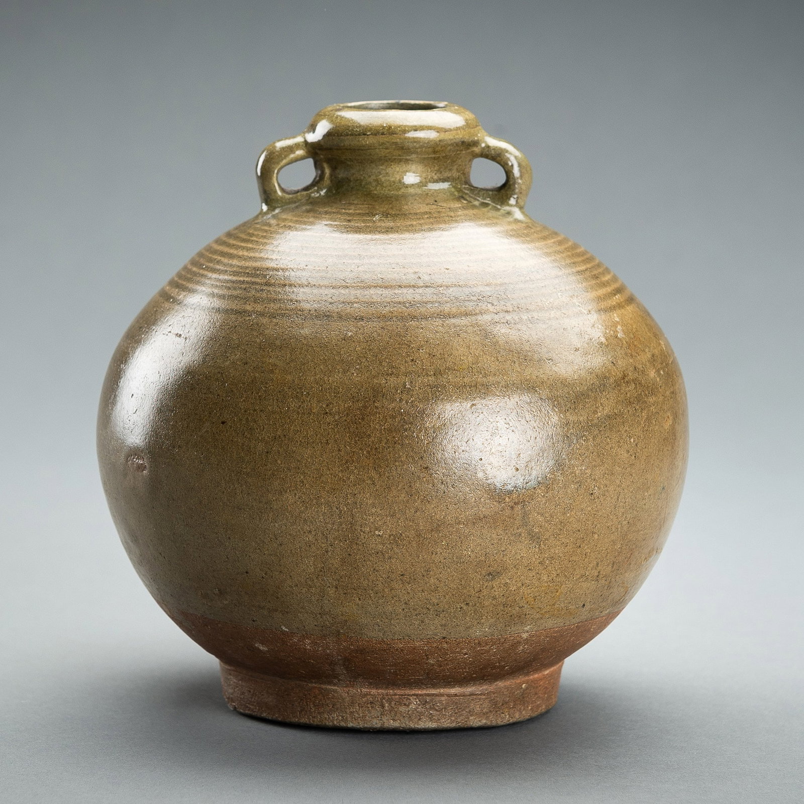 A SUKHOTHAI CELADON GLAZED POTTERY JAR, 15TH CENTURY (1 of 13)