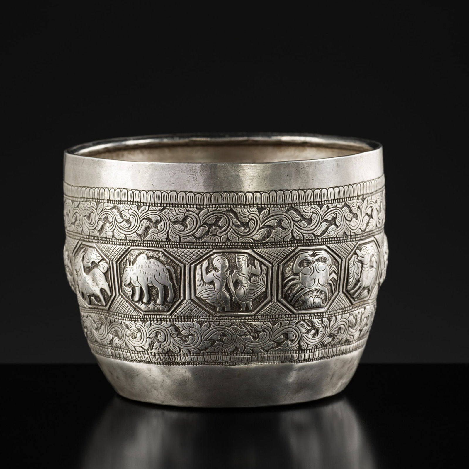 AN EMBOSSED BURMESE SILVER BOWL WITH FIGURAL AND ANIMAL RELIEF, c. 1900s (1 of 8)