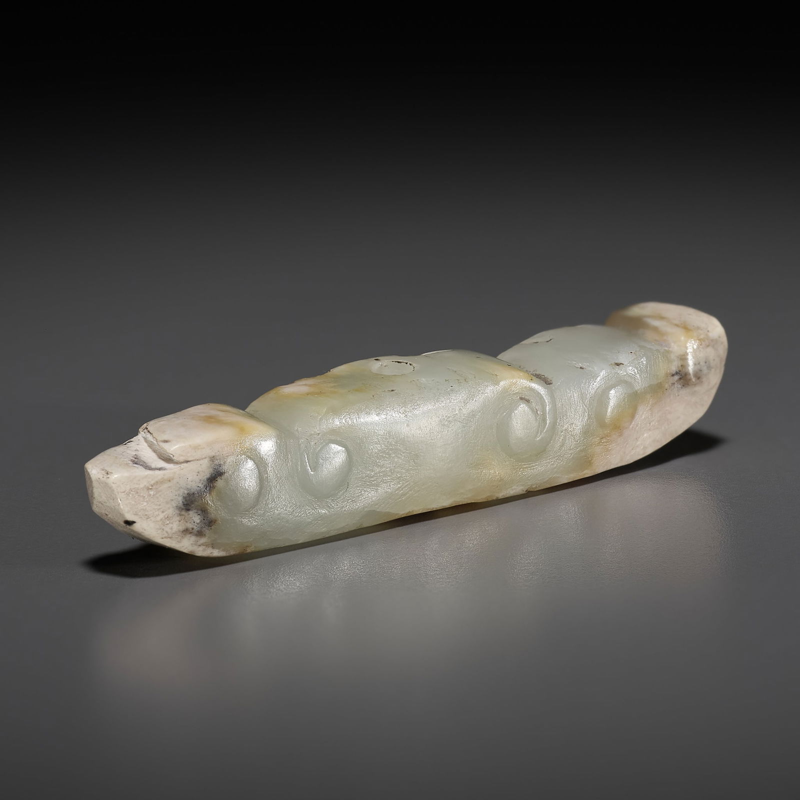 A JADE 'SILKWORM' PENDANT, LATE NEOLITHIC PERIOD TO SHANG DYNASTY (1 of 12)