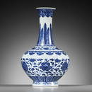 A BLUE AND WHITE 'MING-STYLE' BOTTLE VASE, QIANLONG MARK AND PERIOD