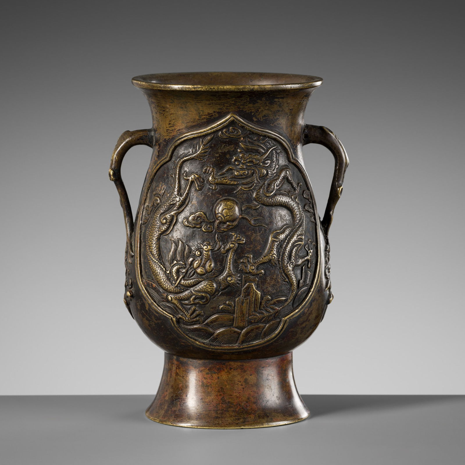 A BRONZE 'DRAGONS AND PHOENIXES' VASE, HU, QING DYNASTY (1 of 10)