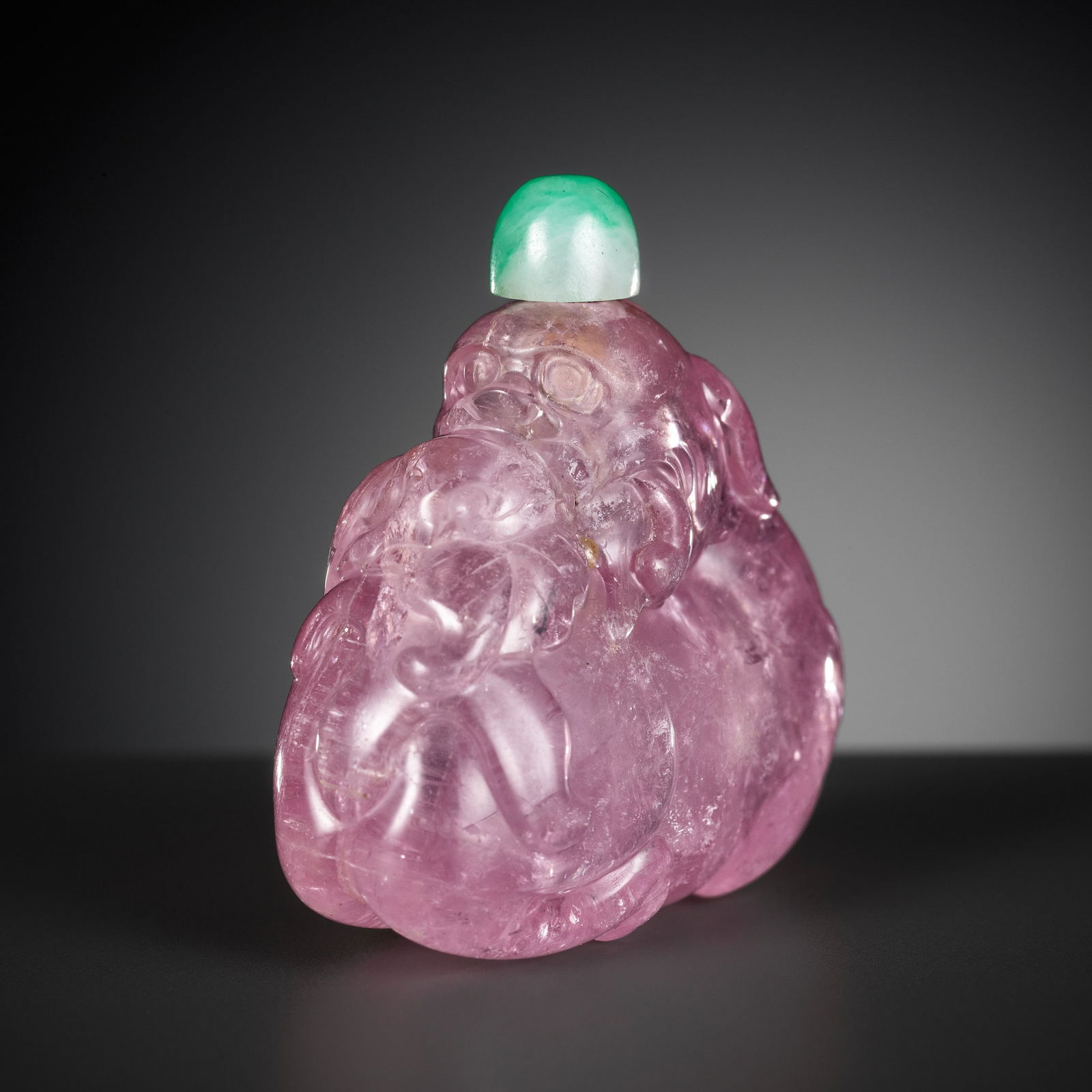 A PINK TOURMALINE 'BUDDHIST LION AND LINGZHI' SNUFF BOTTLE, 18TH-19TH CENTURY (1 of 11)