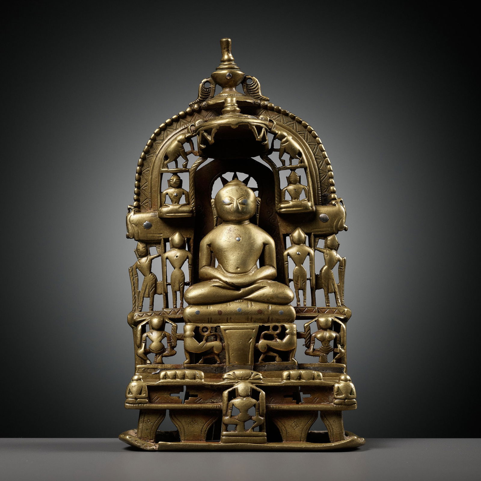 A JAIN COPPER AND SILVER-INLAID BRASS SHRINE, DATED 1463 (1 of 10)