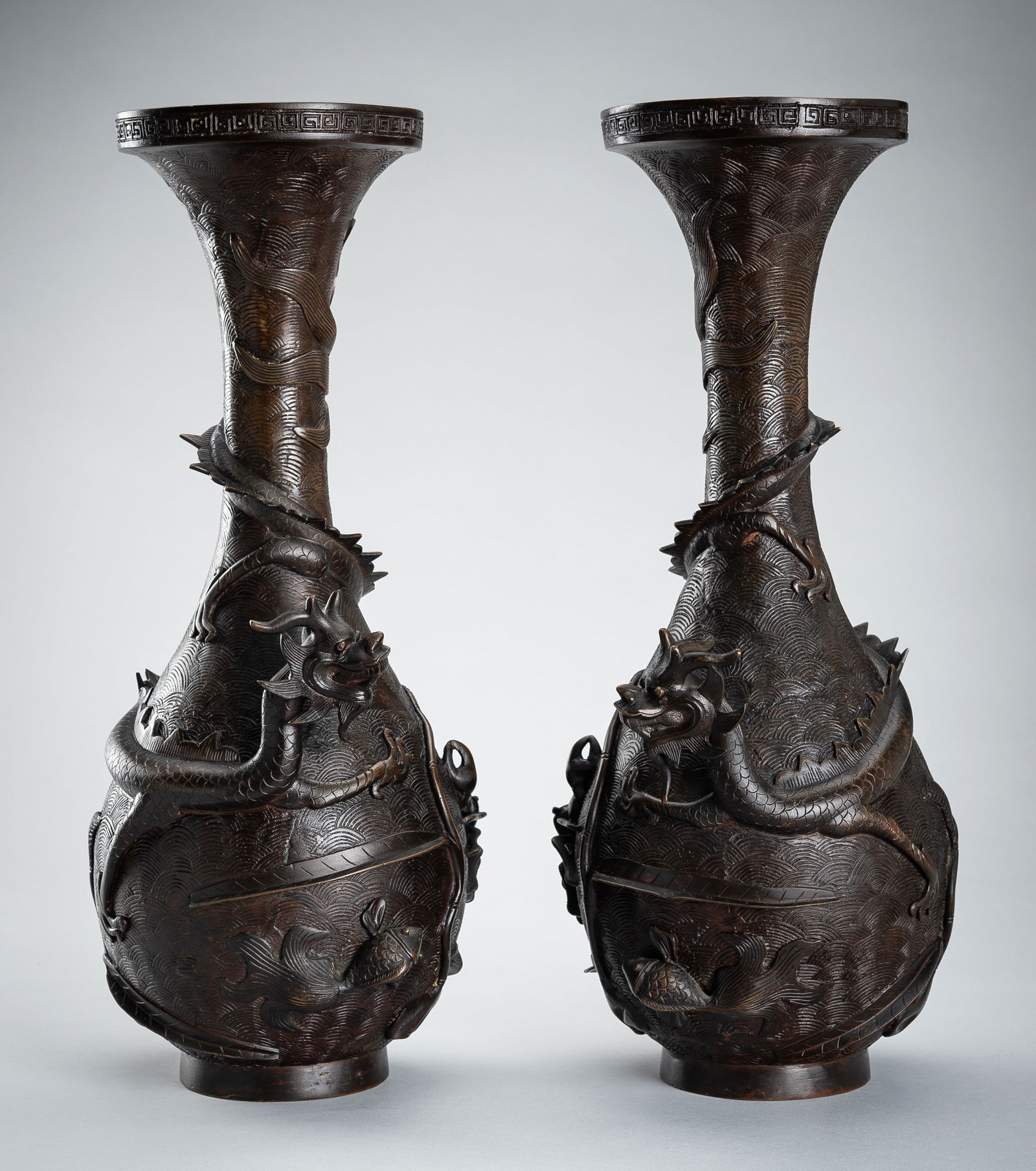 A PAIR OF BRONZE VASES WITH DRAGONS AND MARINE LIFE (1 of 17)