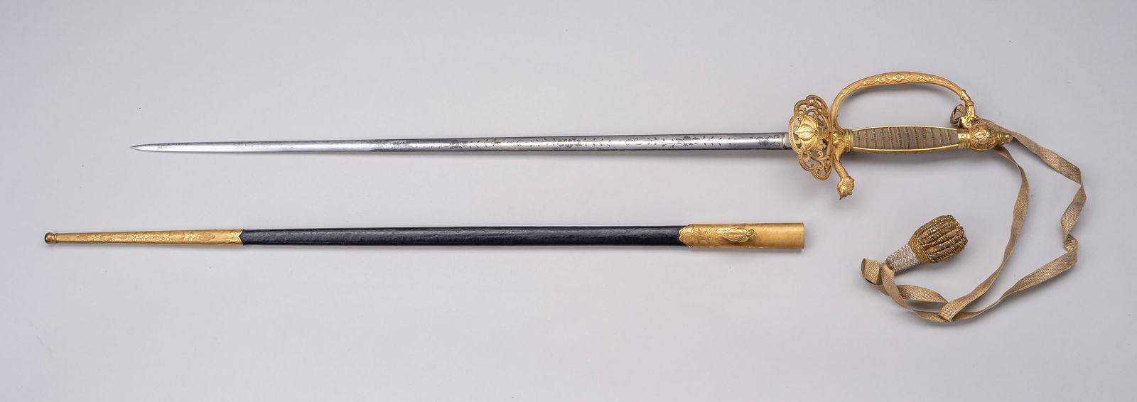 A GILT METAL 'PAULOWNIA' SMALL-SWORD FOR THE WESTERN MARKET (1 of 9)