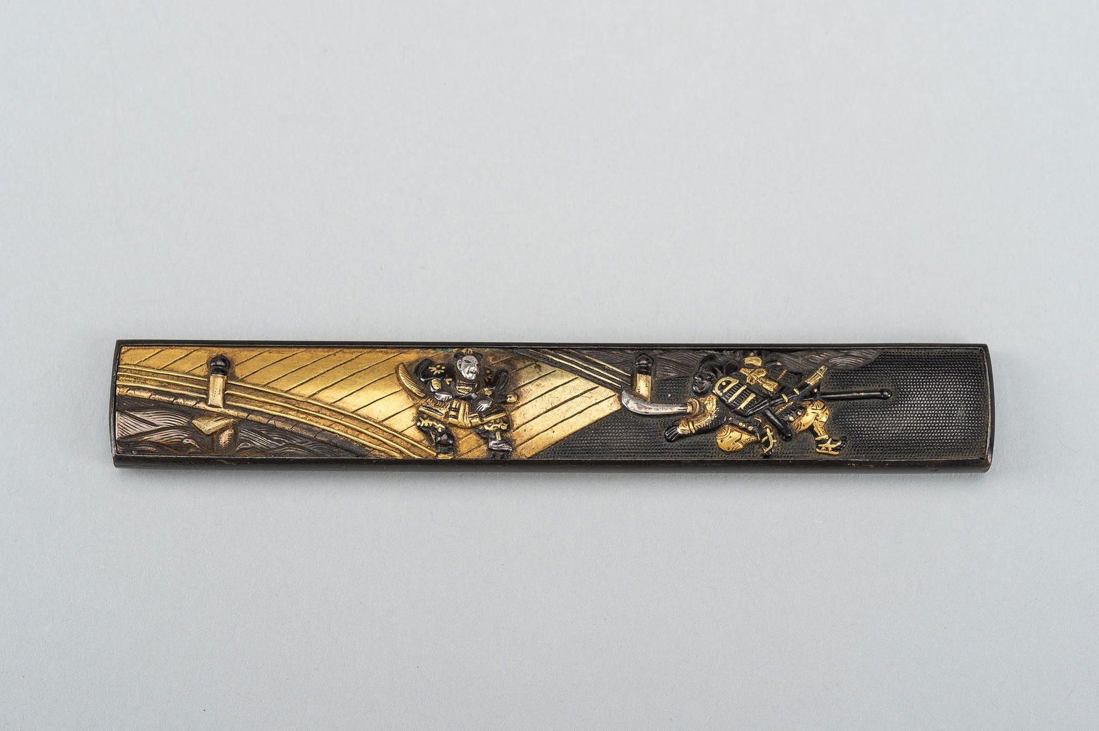 A FINE SHIBUICHI KOZUKA WITH DUELING SAMURAI (1 of 5)