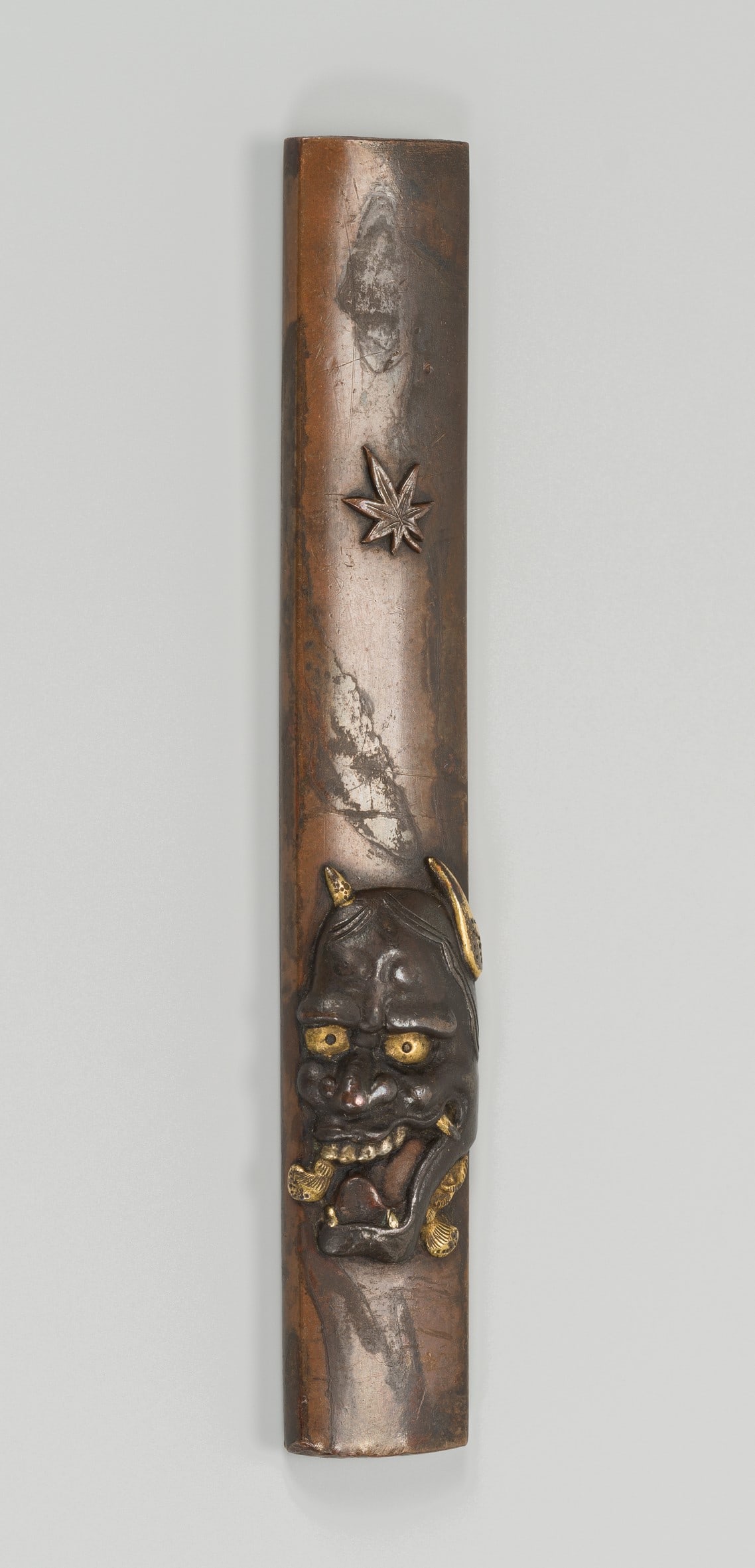MASAYUKI: A SUAKA (REFINED COPPER) AND SHIBUICHI KOZUKA WITH A HANNYA MASK AND MAPLE LEAF REFERRING: MASAYUKI: A SUAKA (REFINED COPPER) AND SHIBUICHI KOZUKA WITH A HANNYA MASK AND MAPLE LEAF REFERRING TO MOMIJIGARI By Masayuki, signed MasayukiJapan, Edo period (1615-1868)The su