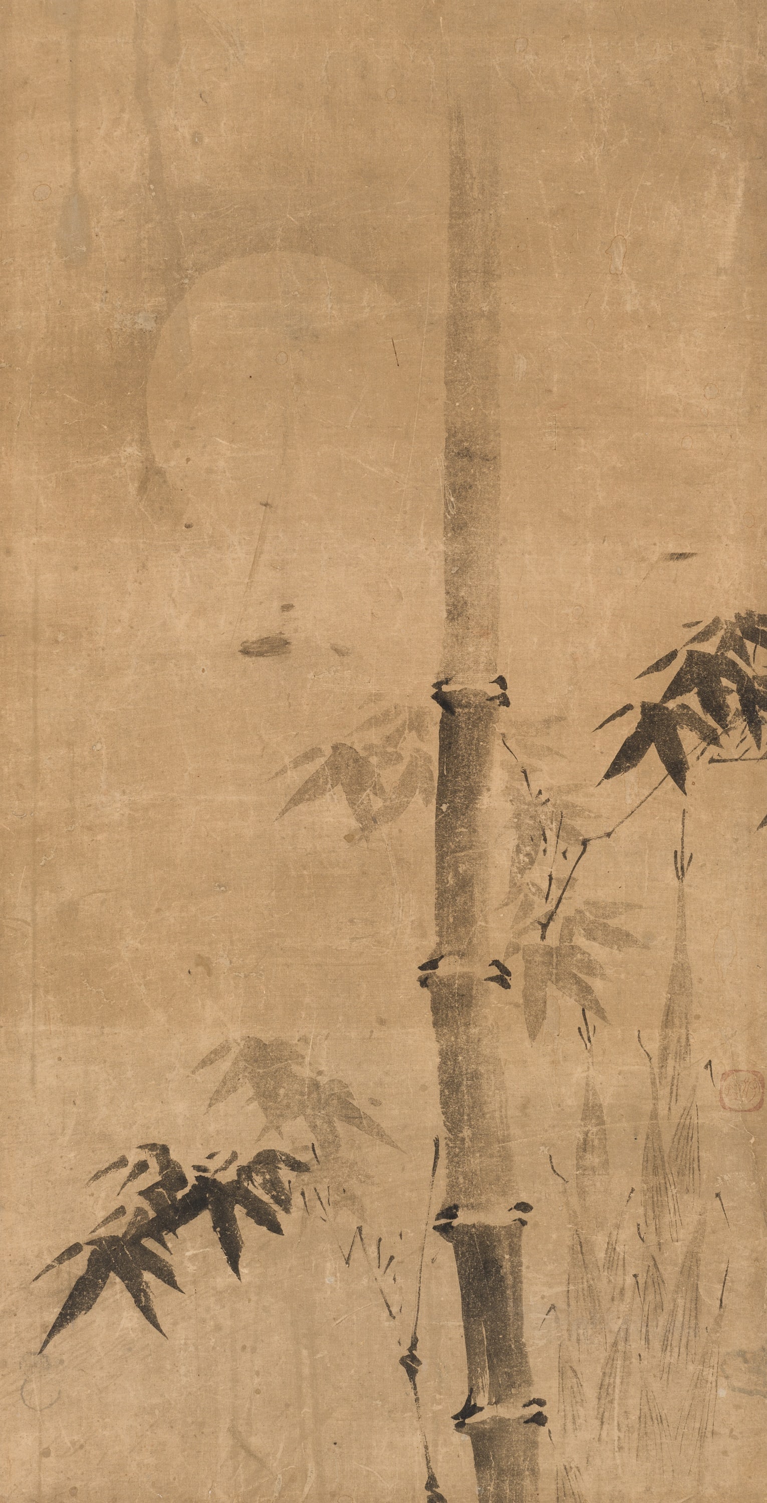 A PAINTING OF BAMBOO AND MOON, ATTRIBUTED TO KANO TAN'YU: A PAINTING OF BAMBOO AND MOON, ATTRIBUTED TO KANO TAN'YU Signed with seal KanoJapan, 17th-18th century, Edo Period (1615-1868)Ink on paper. Mounted on a silk brocade frame and set inside a vintage fra