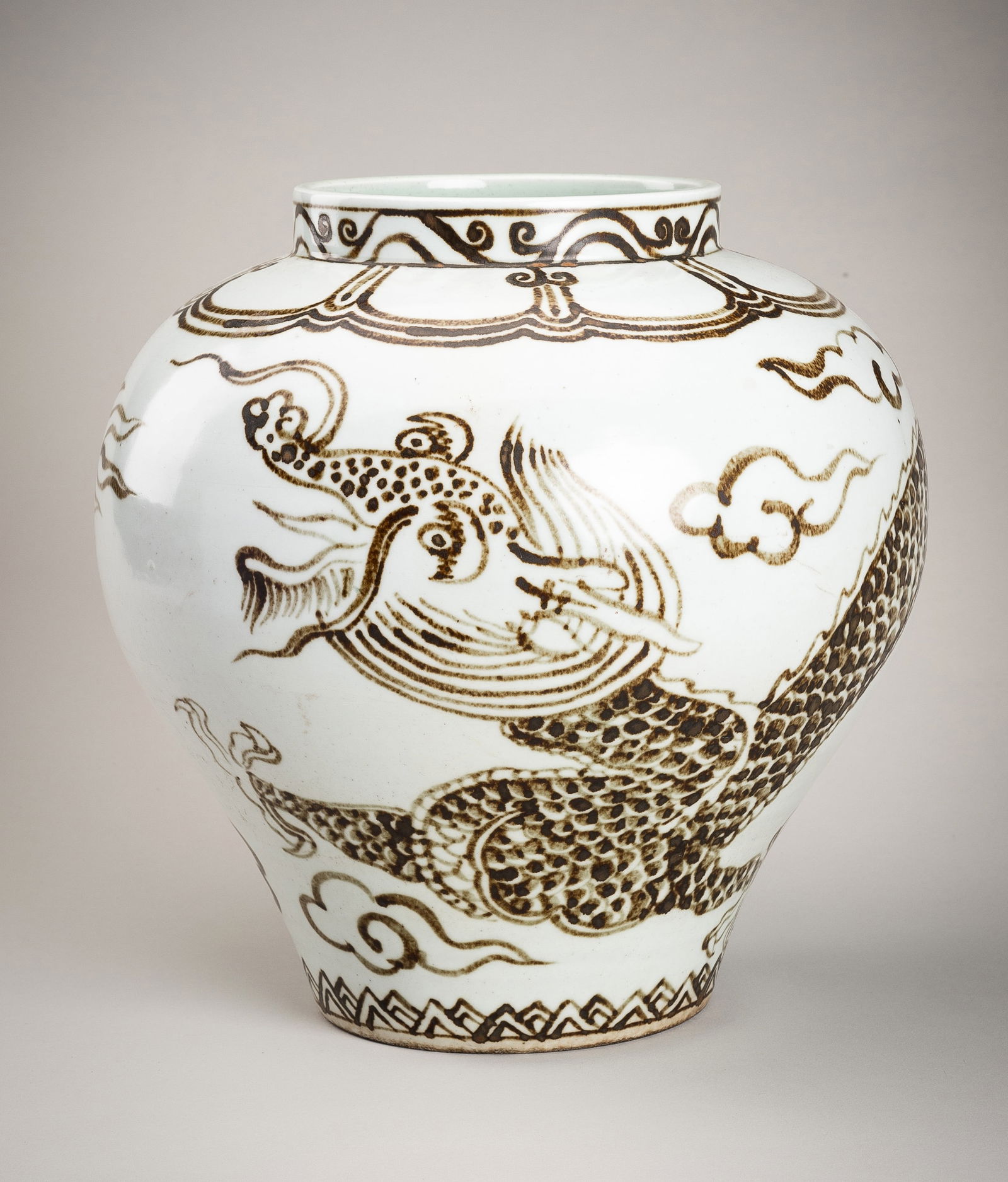 AN UNDERGLAZE IRON-BROWN 'DRAGON' PORCELAIN JAR, JOSEON DYNASTY (1 of 15)